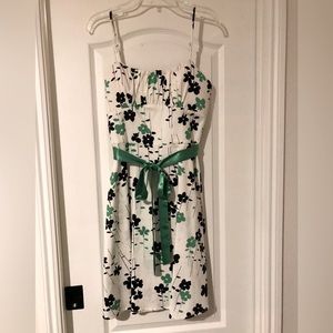 White, green, and black sundress with green sash. Size 10.